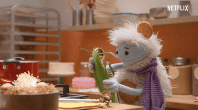 Stuffed Animal Holding Corn On The Cob GIF