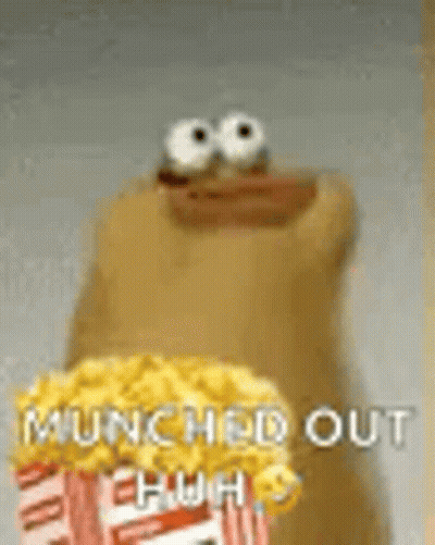 Stuffed Animal Holding Popcorn Says Launched Out Ehhh GIF