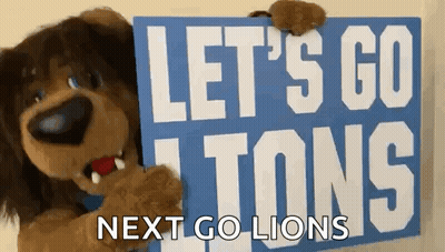 Stuffed Animal Holding Sign Let's Go Tons Next Go Lions GIF