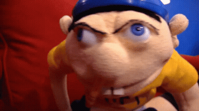 Stuffed Animal In Blue Hat And Yellow Shirt GIF