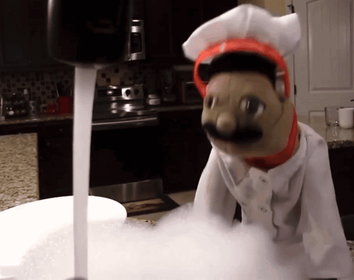 Stuffed Animal In Chef Hat Next To Sink GIF