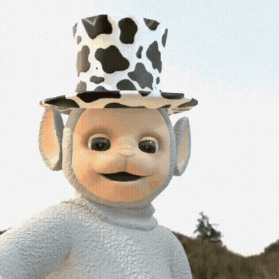 Stuffed Animal In Cow Print Top Hat GIF