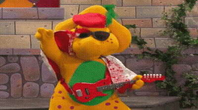 Stuffed Animal In Sunglasses And Red Hat Playing Red Guitar GIF