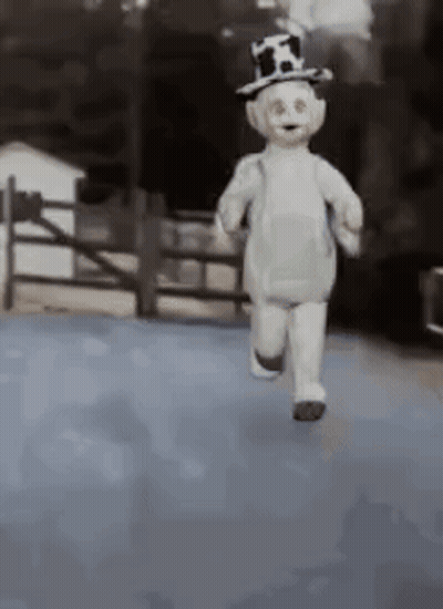 Stuffed Animal In Top Hat Running GIF