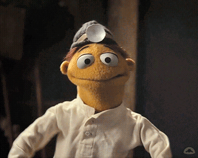 Stuffed Animal In White Shirt And Gray Hat GIF