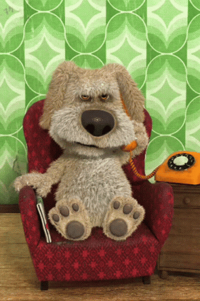 Stuffed Animal Sitting In Red Chair Talking On Phone GIF