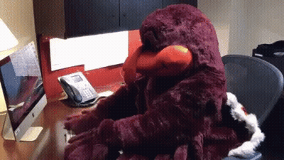 Stuffed Animal Talking On Telephone Desk GIF