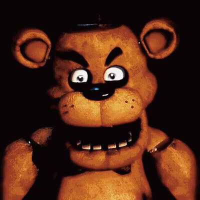 Stuffed Animal With Big Eyes And Sharp Teeth GIF