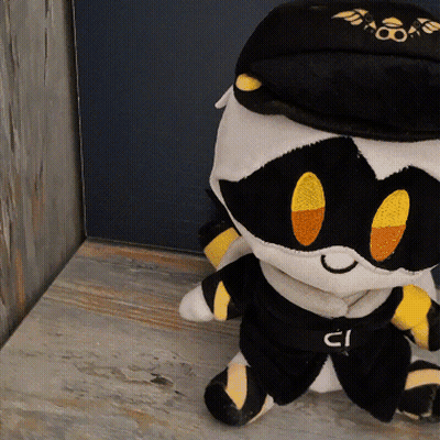 Stuffed Animal With Black Hat And Belt With CI GIF