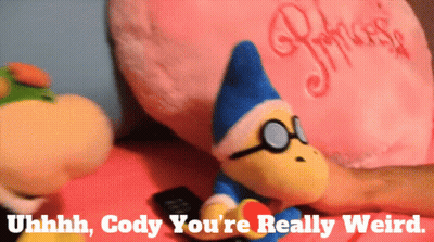 Stuffed Animal With Glasses Next To Princess Pillow GIF