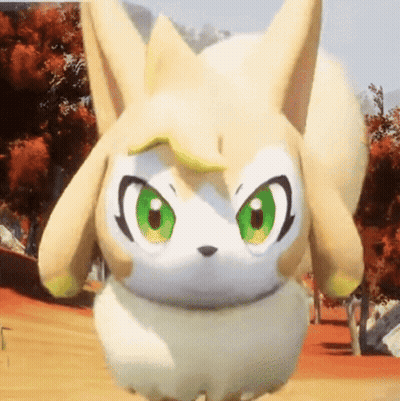 Stuffed Animal With Green Eyes And Yellow Tail GIF