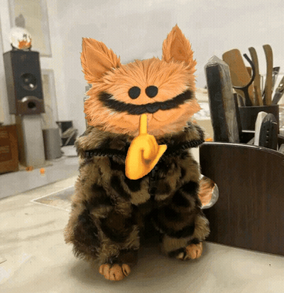 Stuffed Animal With Mustache And Yellow Finger On Mouth GIF