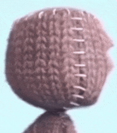 Stuffed Animal With Stitched Face GIF