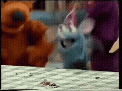 Stuffed Animals Around Checkered Table GIF