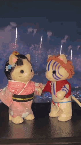 Stuffed Animals Next To Fireworks GIF