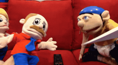 Stuffed Animals Sitting On Red Couch Remote Control GIF
