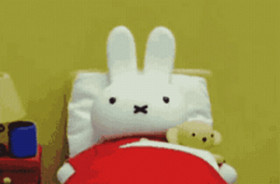 Stuffed Bunny And Teddy Bear In Bed GIF