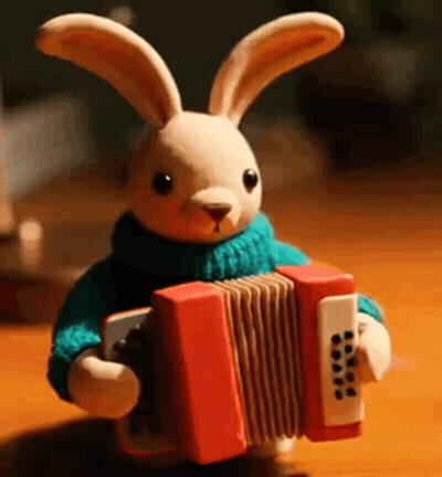 Stuffed Bunny Holding Accordion GIF
