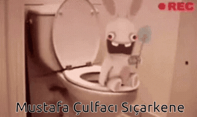 Stuffed Bunny Sitting On Toilet Mustafa Culfaci Sicarkene GIF