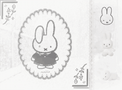 Stuffed Bunny With Cross In Hand GIF