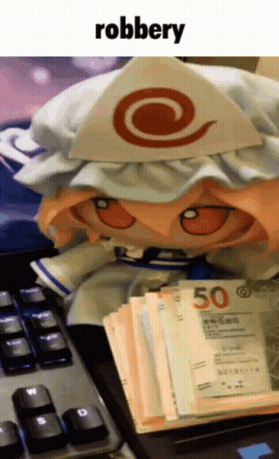 Stuffed Doll Next To Money Pile Saying Robbery GIF
