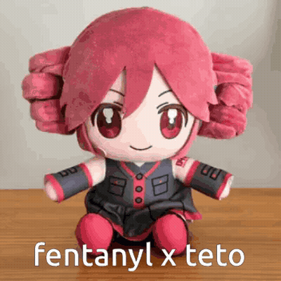 Stuffed Doll With Red Hair GIF