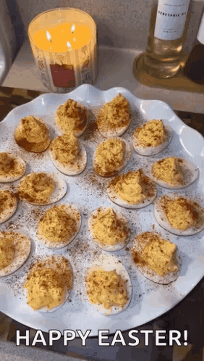 Stuffed Eggs With Candle And Happy Easter GIF