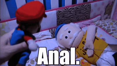 Stuffed Mario And Peanut Man Laying On Bed Saying Anal GIF