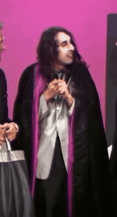 Stuffed Monkey With TV Peru Logo GIF