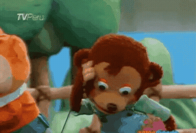 Stuffed Monkey With TV Peru Logo GIF