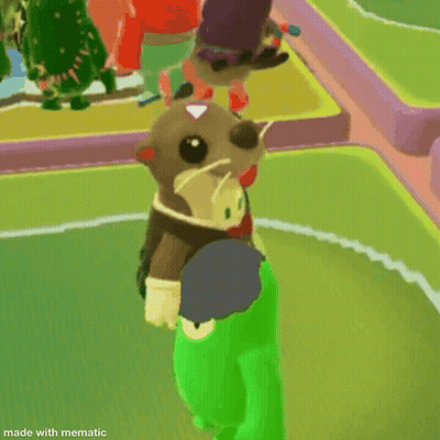 Stuffed Otter Wearing Bow Tie And Wreath GIF