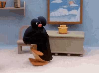 Stuffed Penguin Dancing In Room GIF