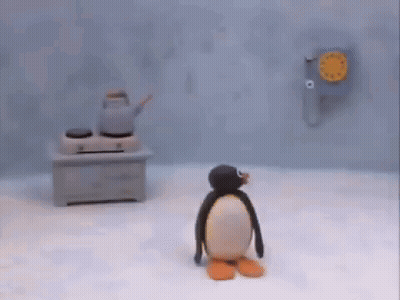 Stuffed Penguin Next To Man With Headphones GIF
