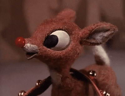 Stuffed Reindeer With Red Nose And Bells GIF