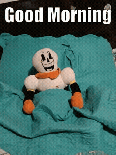 Stuffed Skeleton Laying On Bed Saying Good Morning GIF