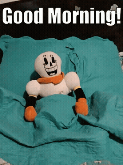 Stuffed Skeleton Laying On Bed Saying Good Morning GIF