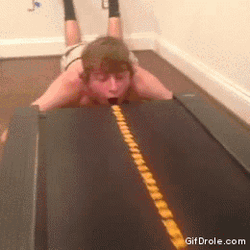 Stupid Guy Catching Food From Treadmill GIF