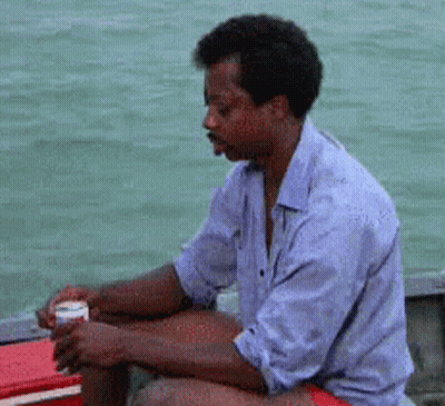 Styrofoam Container Of Chicken And Fries With Cane's Drink GIF