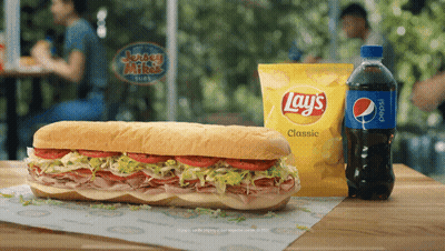 Sub Sandwich Next To Lays Chips GIF