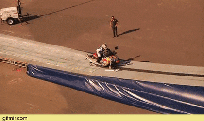 Successful High Snowmobile Jump GIF