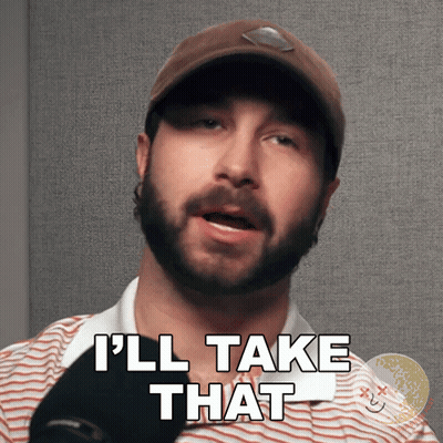 Suit-And-Tie Man By Flag Says I'll Allow GIF