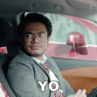 Suit And Tie Man Driving Car With Yo GIF