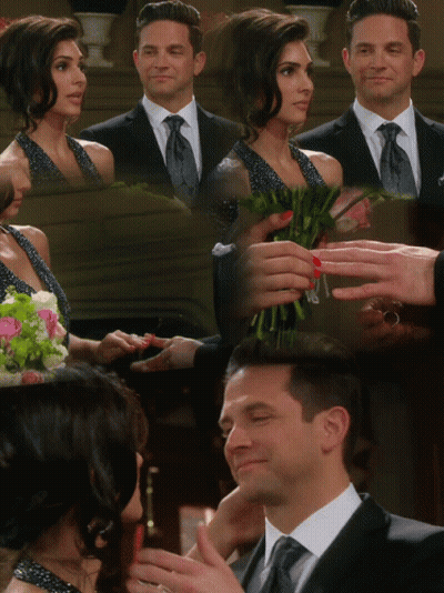 Suit And Tie Man Holding Woman's Hand With Bouquet GIF