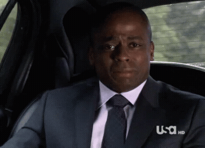 Suit And Tie Man In USA Car Backseat GIF