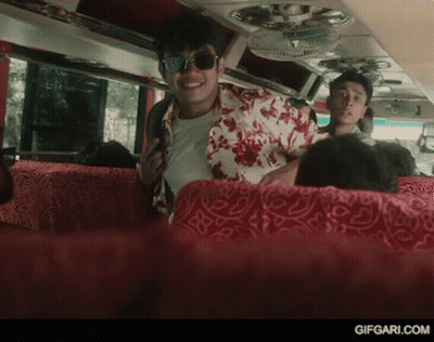 Suit And Tie Man Walking Beside Man In White U Shirt GIF