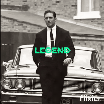 Suit Man Beside Car With Legend GIF
