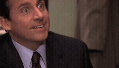 Suit Man Next To Yellow Shirt Man GIF