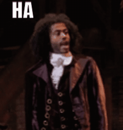Suit Man Says Yeah Right To Another GIF
