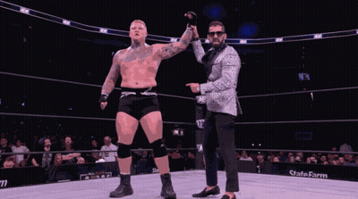 Suit Man Talking In Wrestling Ring AAW GIF