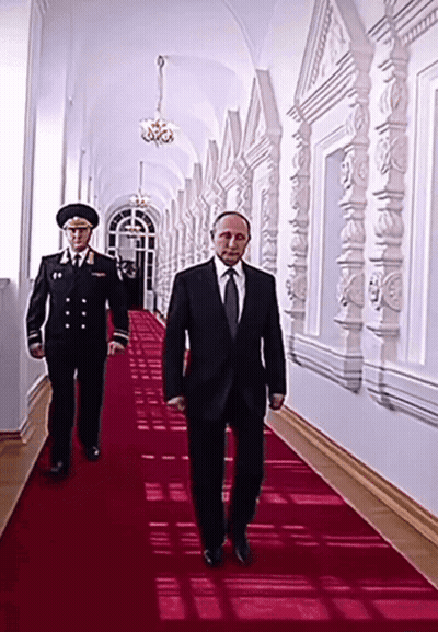 Suit Tie Man Walking With Two Men In Uniform GIF